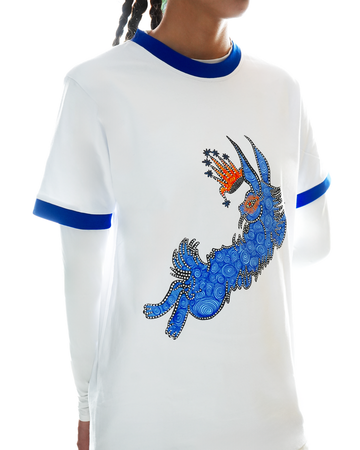 Art of Running ringer t-shirt by Lievre Running featuring a white base with blue ribbed collar and sleeves, detailed illustrated rabbit graphic by artist Adrien Sabbah on the front.