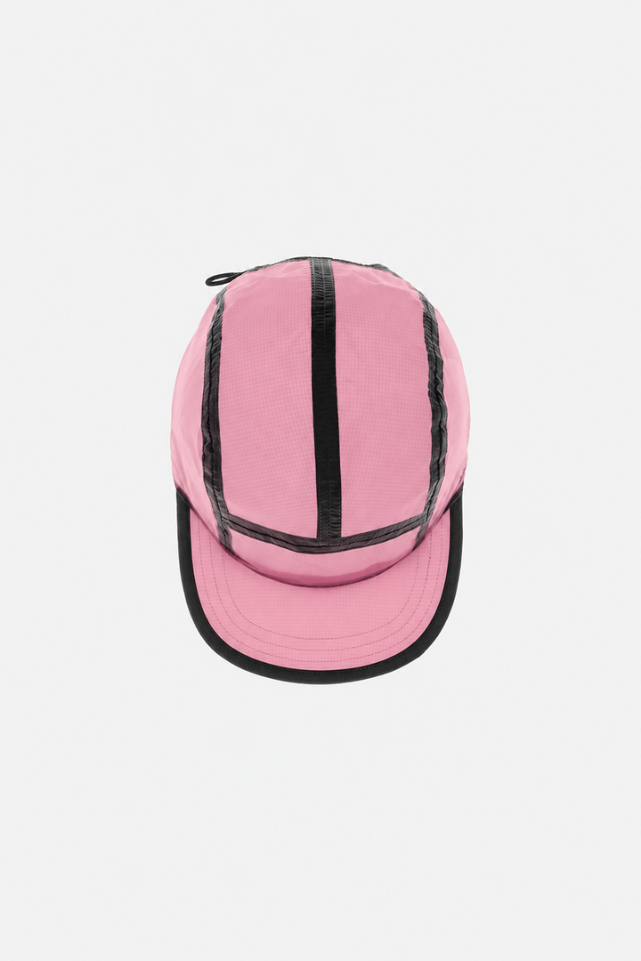 Lievre Running soft pink performance running cap, lightweight technical fabric with adjustable back cord and "Engineered for the Art of Running" text on the side panel.