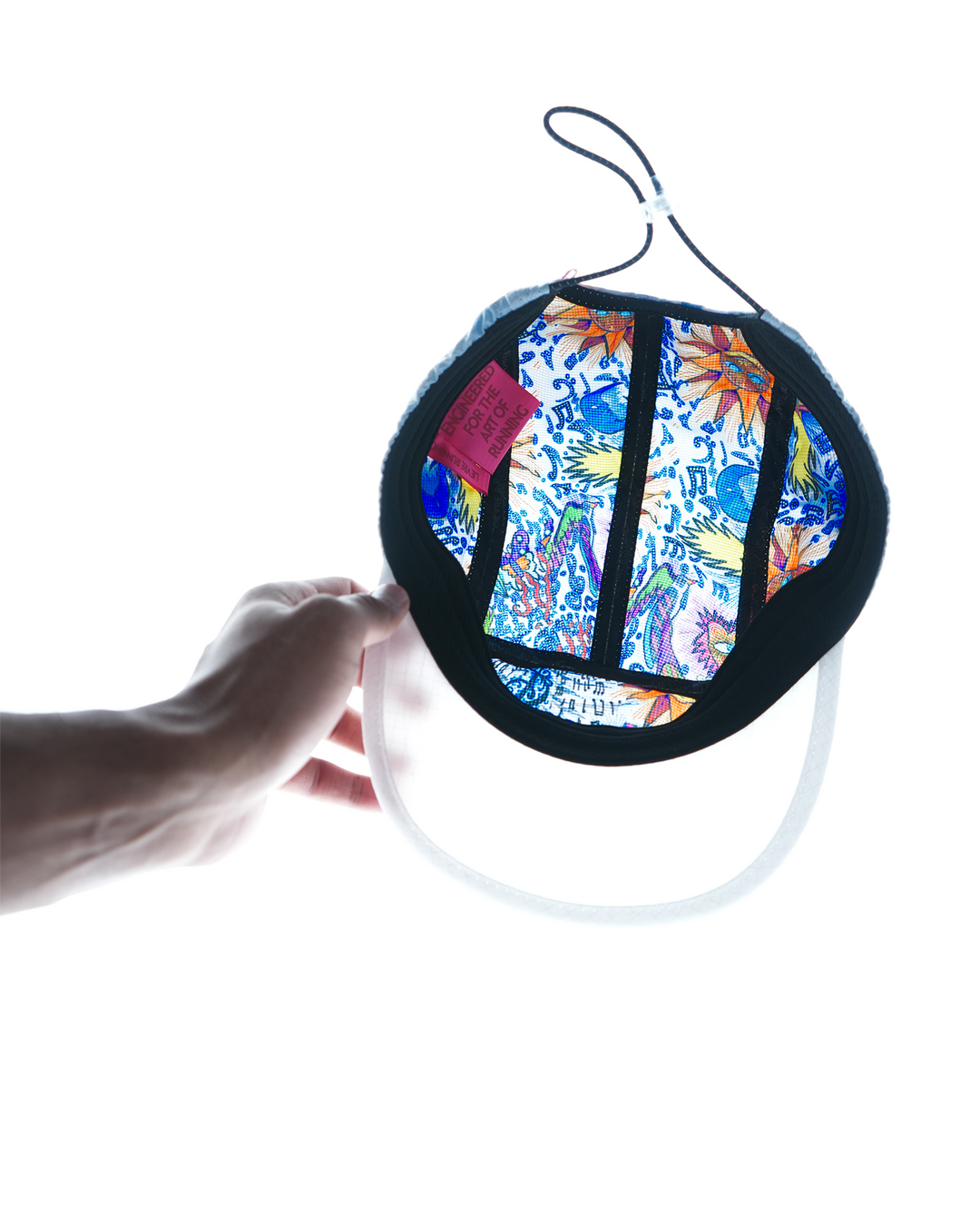 Art of Running performance cap by Lievre Running featuring a vibrant multicolour illustrated pattern by artist Adrien Sabbah, lightweight construction with breathable mesh panels and adjustable fit.