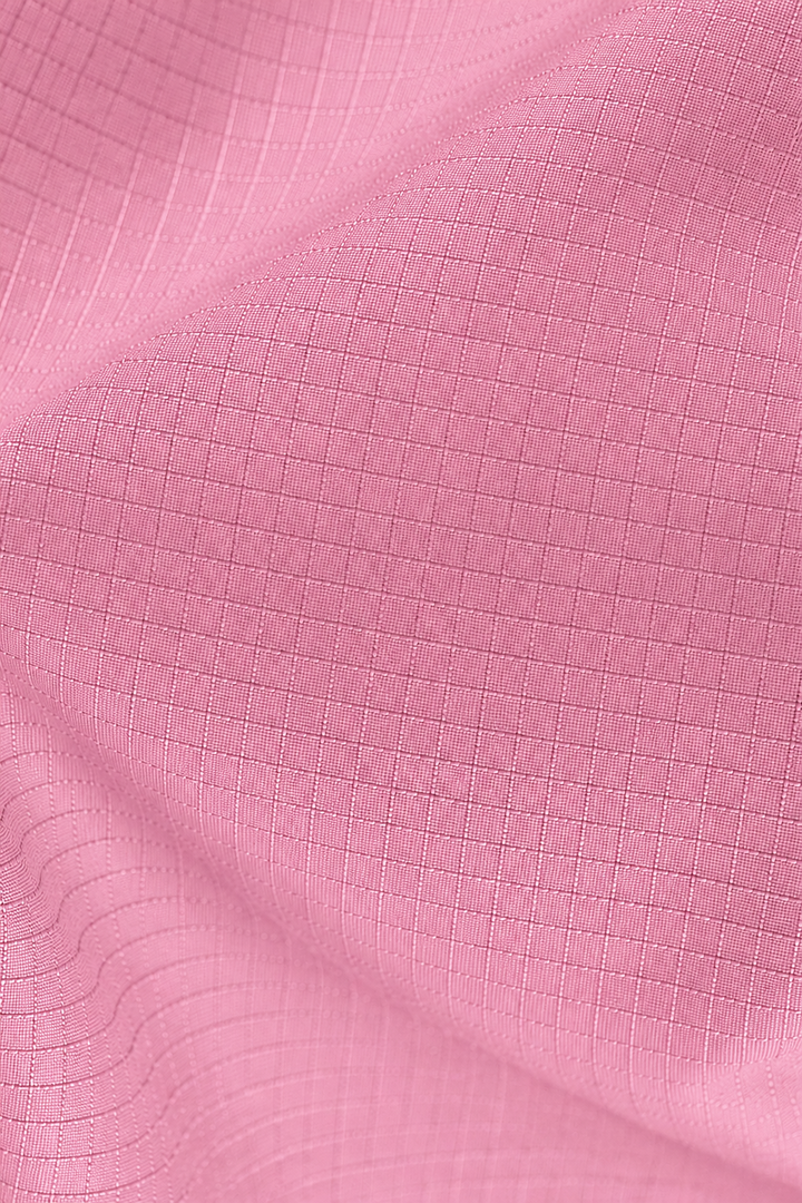 Lievre Running soft pink performance running cap, lightweight technical fabric with adjustable back cord and "Engineered for the Art of Running" text on the side panel.