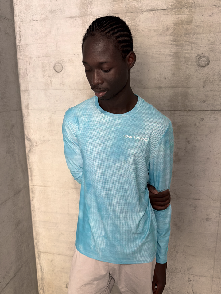 Lievre Running Sky Blue Long Sleeve, 180g breathable stretch fabric engineered for performance running, tailored performance fit with odor control.