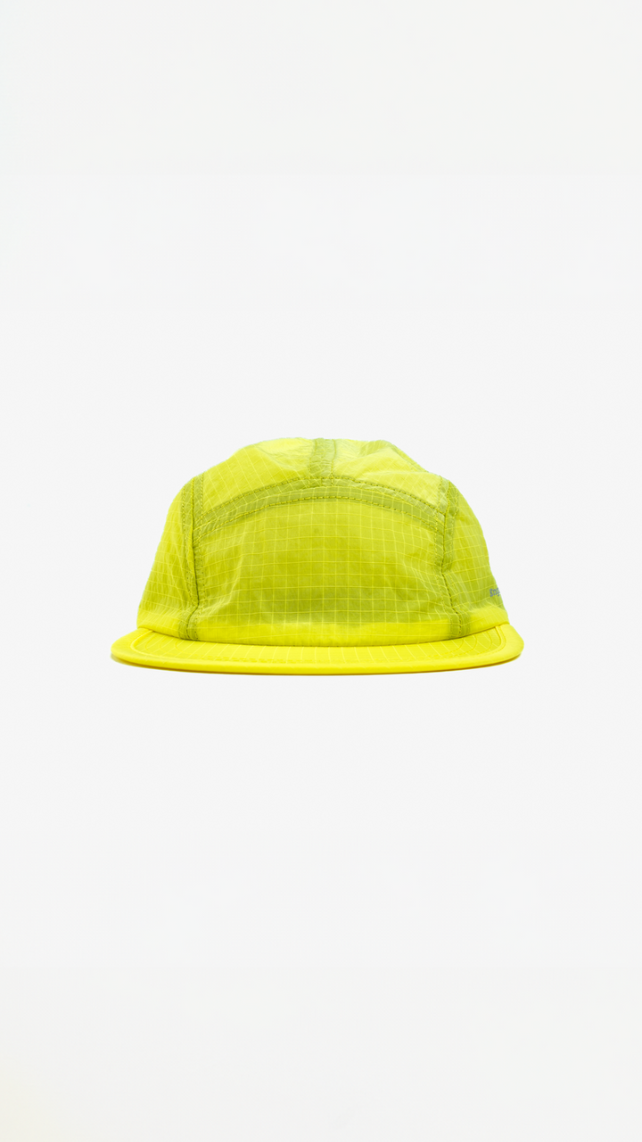Lievre Running yellow performance running cap, lightweight technical fabric with adjustable back cord and “Engineered for the Art of Running” text on the side panel.
