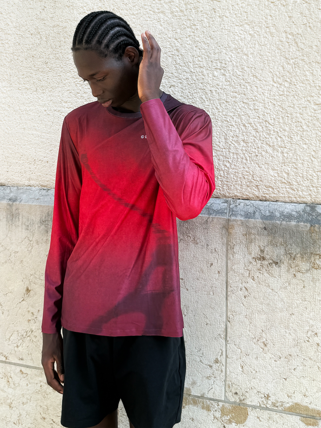 Lievre Running Lightweight Red LS shirt showcasing a gradient of red tones inspired by the French flag.