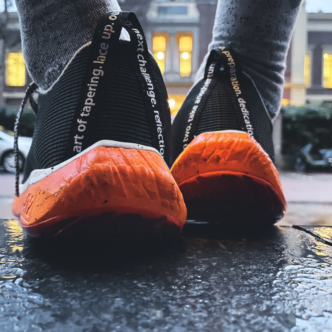 4T2 weekdays running shoes showcasing a comfortable and neutral design with a wider base for stability.