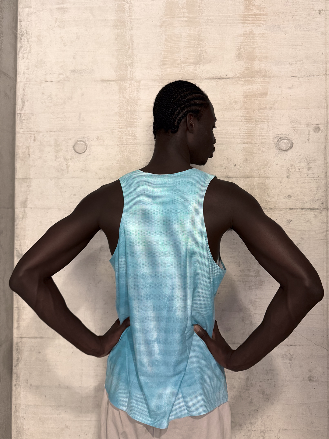 Lievre Running Sky Blue Singlet, 180g breathable stretch fabric cut sleeveless for maximum airflow, performance fit for warm-weather running and race days.