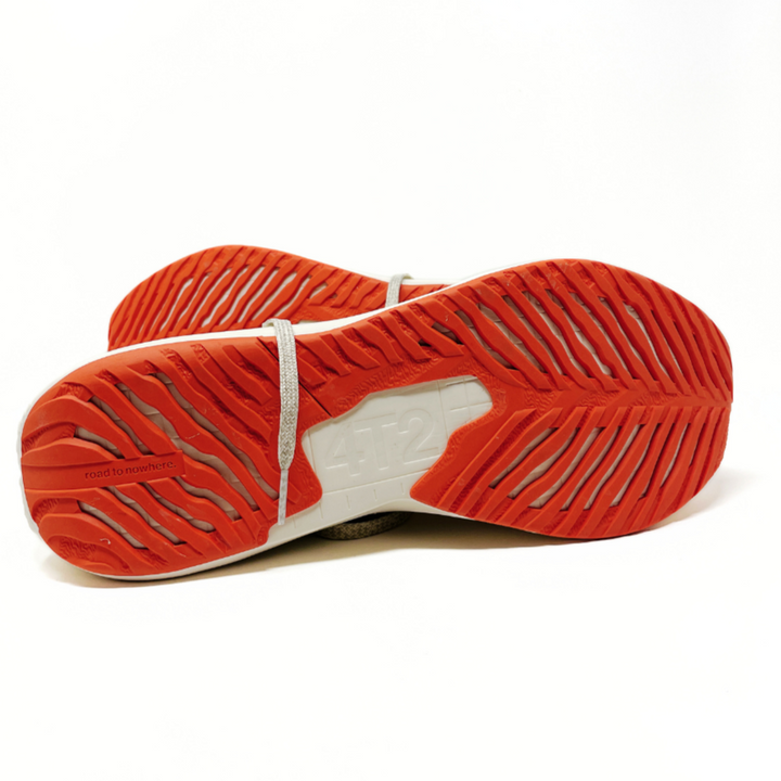 Close-up view of 4T2 weekdays vintage white running shoes showcasing comfort features and durable outsole.