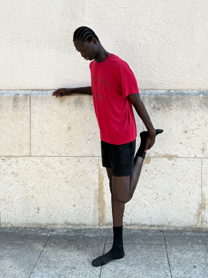 Red Print T-shirt from Lievre Running, featuring a soft fabric blend and oversized fit, perfect for casual wear.