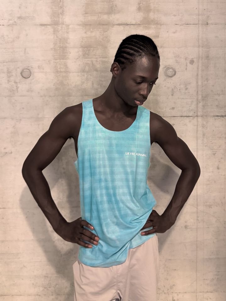 Lievre Running Sky Blue Singlet, 180g breathable stretch fabric cut sleeveless for maximum airflow, performance fit for warm-weather running and race days.