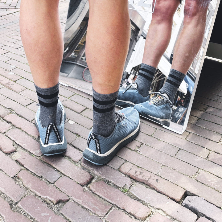 4T2 - weekdays, kind of blue running shoe, showcasing a modern design ideal for urban running.