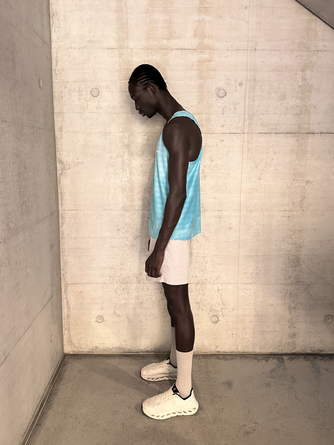 Lievre Running Sky Blue Singlet, 180g breathable stretch fabric cut sleeveless for maximum airflow, performance fit for warm-weather running and race days.