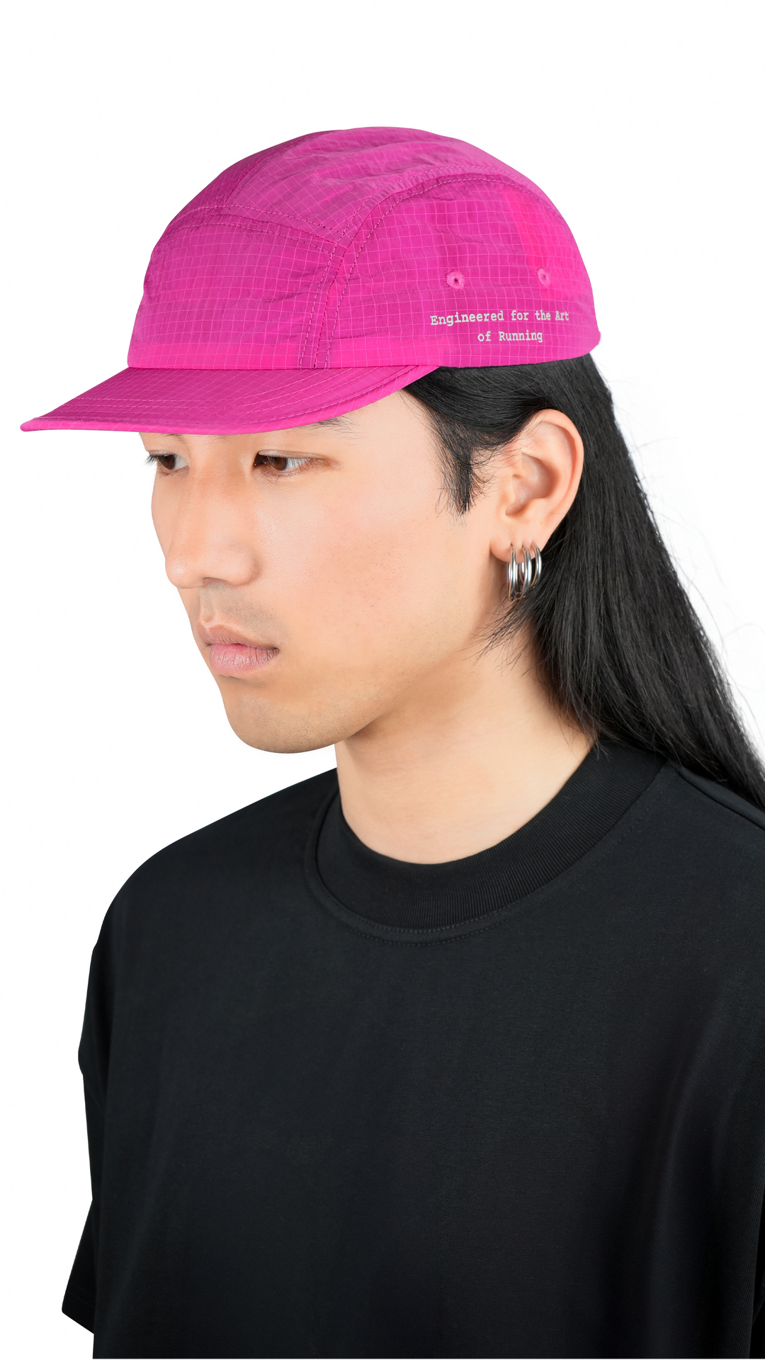 Lievre Running pink performance running cap, lightweight technical fabric with adjustable back cord and “Engineered for the Art of Running” text on the side panel.