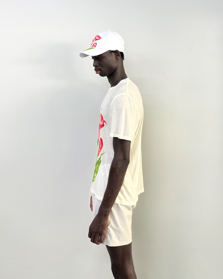 Lievre Running Le Langages des Fleurs running cap, lightweight technical fabric with floral design and adjustable back cord.