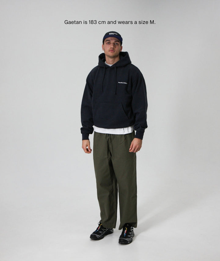 Peaufine Athletics Heavyweight Hoodie Mediterranean Running Club Navy FW26 — worn back