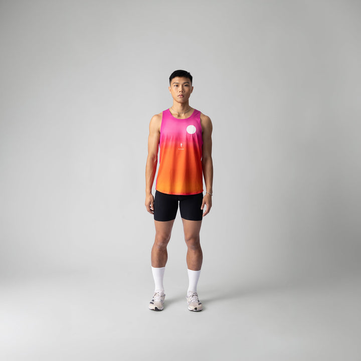 Front view of the Participation Pink Glow Singlet showcasing its breathable fabric and vibrant pink color.
