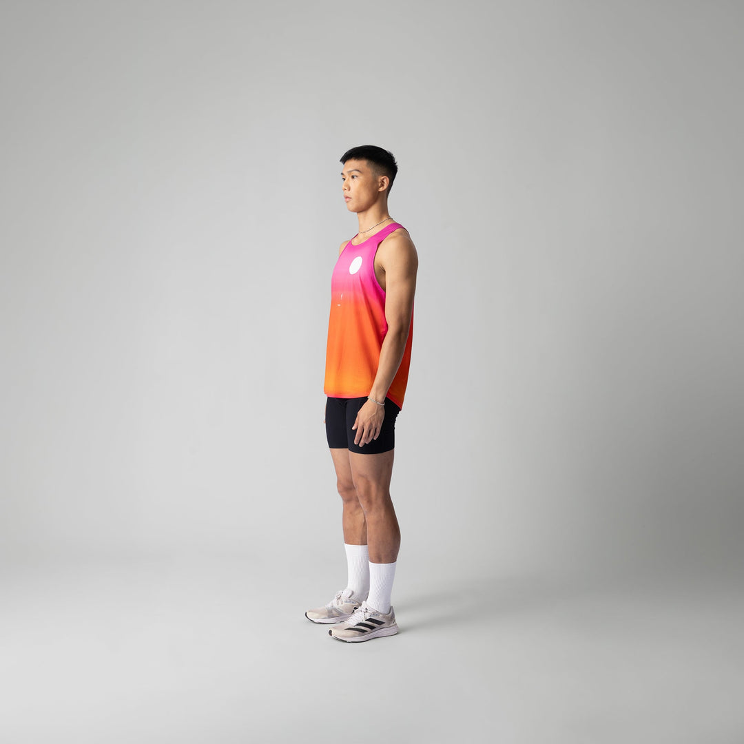 Front view of the Participation Pink Glow Singlet showcasing its breathable fabric and vibrant pink color.