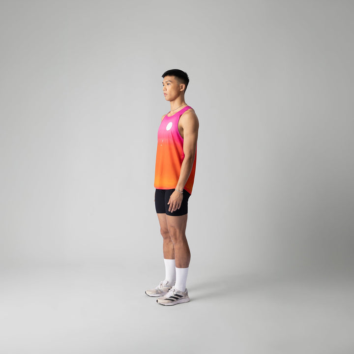 Front view of the Participation Pink Glow Singlet showcasing its breathable fabric and vibrant pink color.