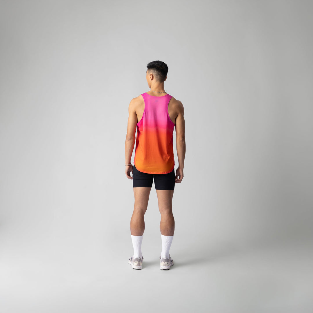 Front view of the Participation Pink Glow Singlet showcasing its breathable fabric and vibrant pink color.