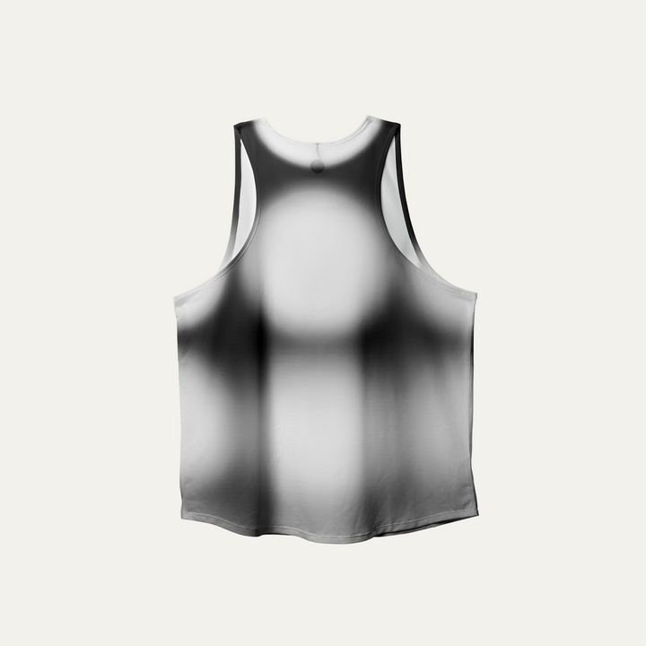 Front view of the Participation Polka Dots Singlet showcasing its breathable design and polka dot pattern.