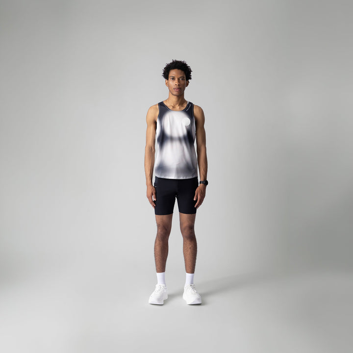Front view of the Participation Polka Dots Singlet showcasing its breathable design and polka dot pattern.
