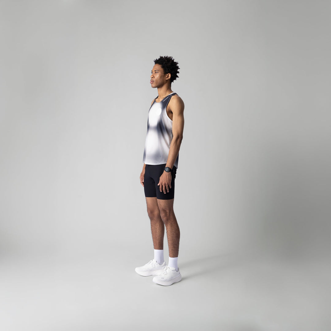Front view of the Participation Polka Dots Singlet showcasing its breathable design and polka dot pattern.