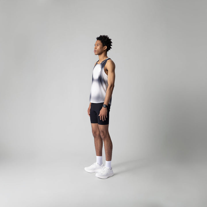 Front view of the Participation Polka Dots Singlet showcasing its breathable design and polka dot pattern.