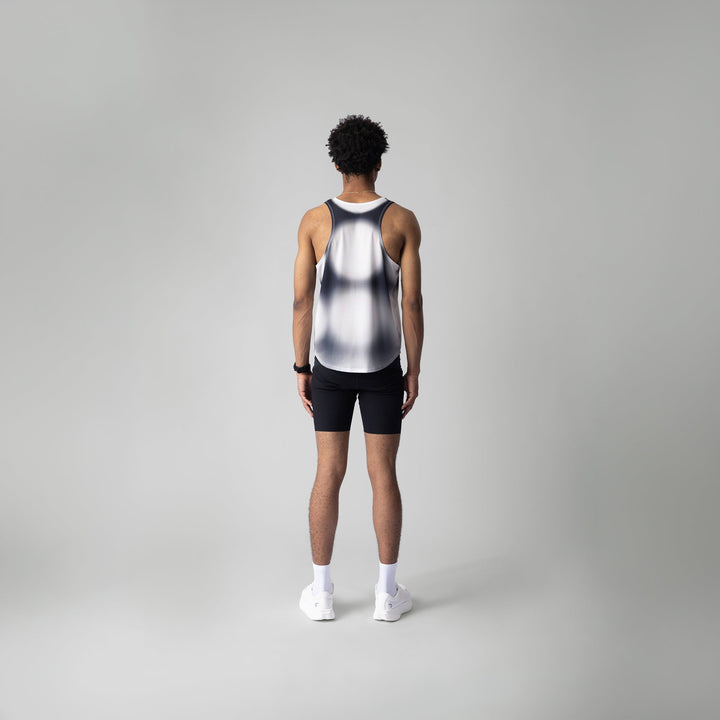 Front view of the Participation Polka Dots Singlet showcasing its breathable design and polka dot pattern.