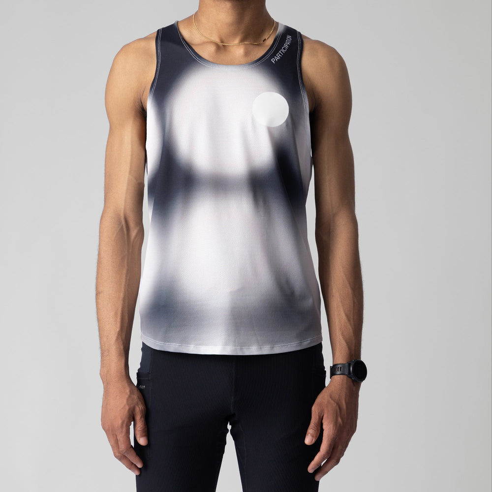 Front view of the Participation Polka Dots Singlet showcasing its breathable design and polka dot pattern.
