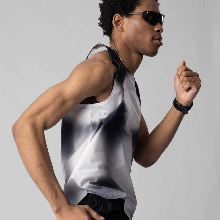 Front view of the Participation Polka Dots Singlet showcasing its breathable design and polka dot pattern.