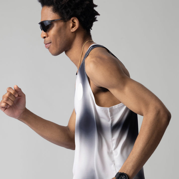 Front view of the Participation Polka Dots Singlet showcasing its breathable design and polka dot pattern.
