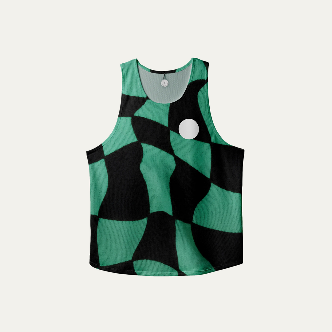 A woman wearing the Green Checker Singlet, showcasing its breathable design and checkered pattern, perfect for running and outdoor activities.