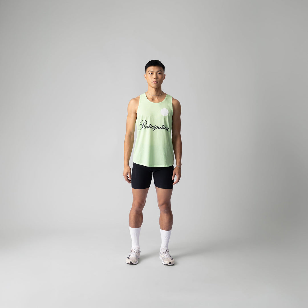 Lightweight green pistachio Exercise Singlet by Participation, designed for breathability and quick-drying for workouts.