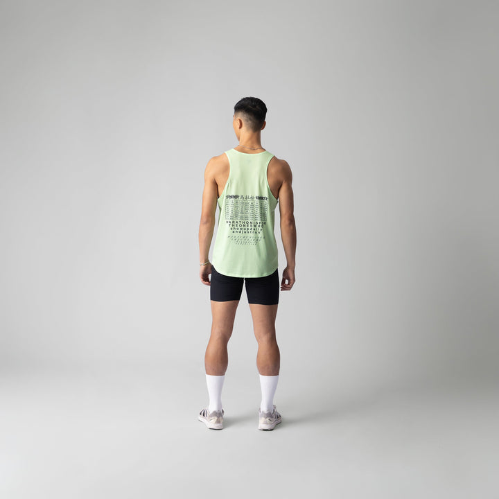 Lightweight green pistachio Exercise Singlet by Participation, designed for breathability and quick-drying for workouts.