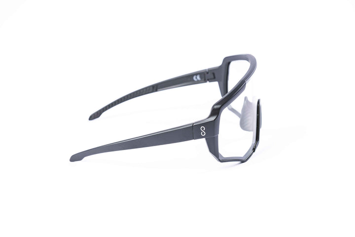 Black Nita XL performance eyewear from Coast Optics with clear Cat 0 lens and more, Bio-TR90 frame shown alone in a neutral studio setting.