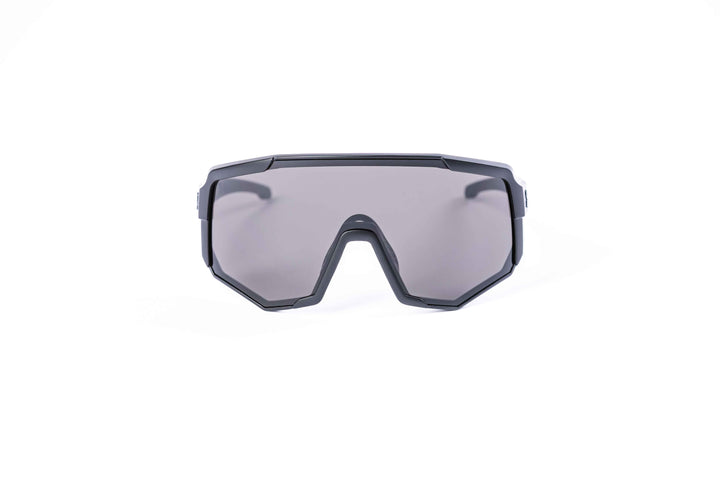 Black Nita XL performance eyewear from Coast Optics with clear Cat 0 lens and more, Bio-TR90 frame shown alone in a neutral studio setting.