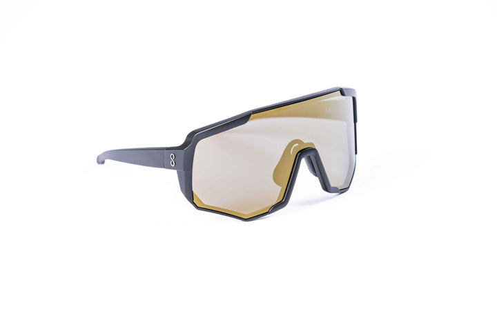 Black Nita XL performance eyewear from Coast Optics with clear Cat 0 lens and more, Bio-TR90 frame shown alone in a neutral studio setting.