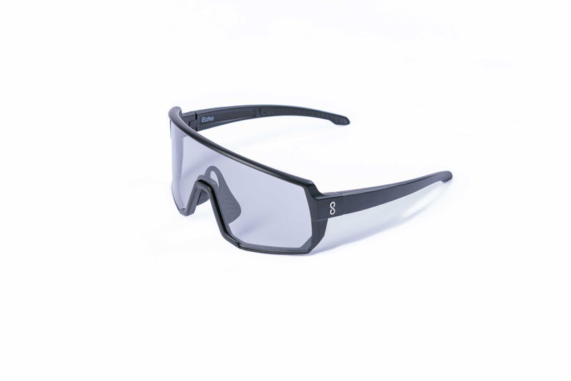 Coast Optics Black Echo Sunglasses with black frame and clear lenses on a white background
