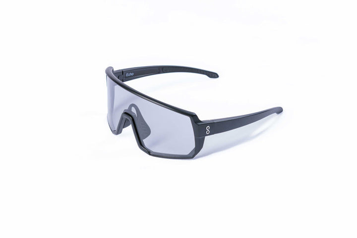 Coast Optics Black Echo Sunglasses with black frame and clear lenses on a white background