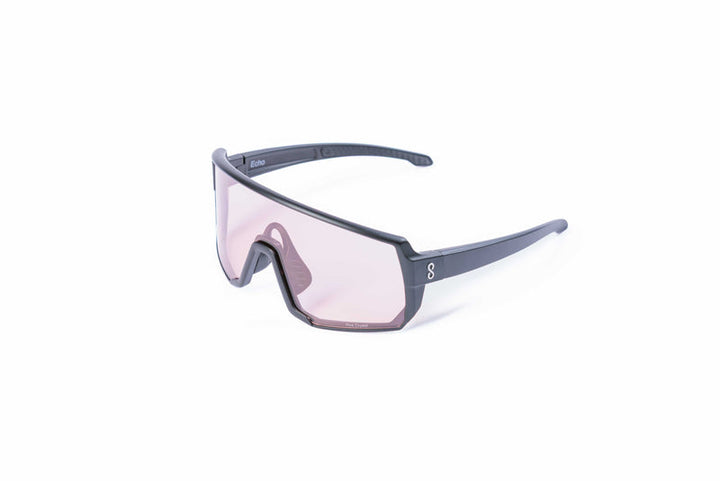 Coast Optics Echo Sunglasses with a dark frame and pink-tinted lenses on a white background
