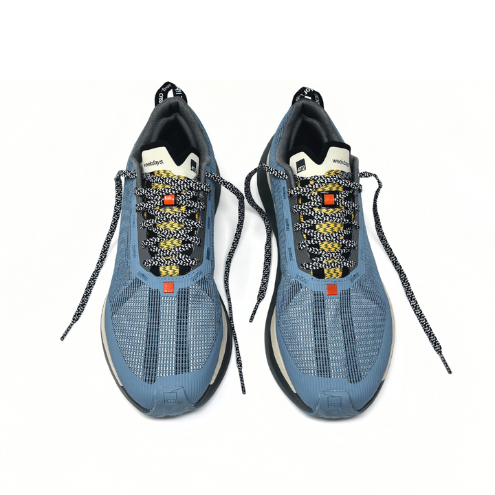 4T2 - weekdays, kind of blue running shoe, showcasing a modern design ideal for urban running.