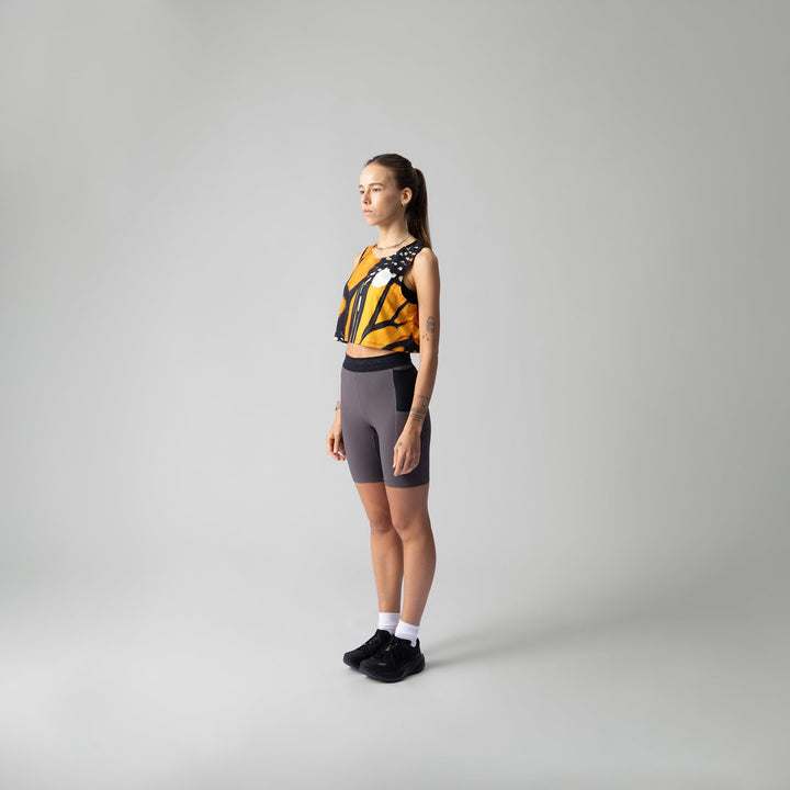 Front view of the Participation Monarch Crop Singlet showcasing its lightweight fabric and design.