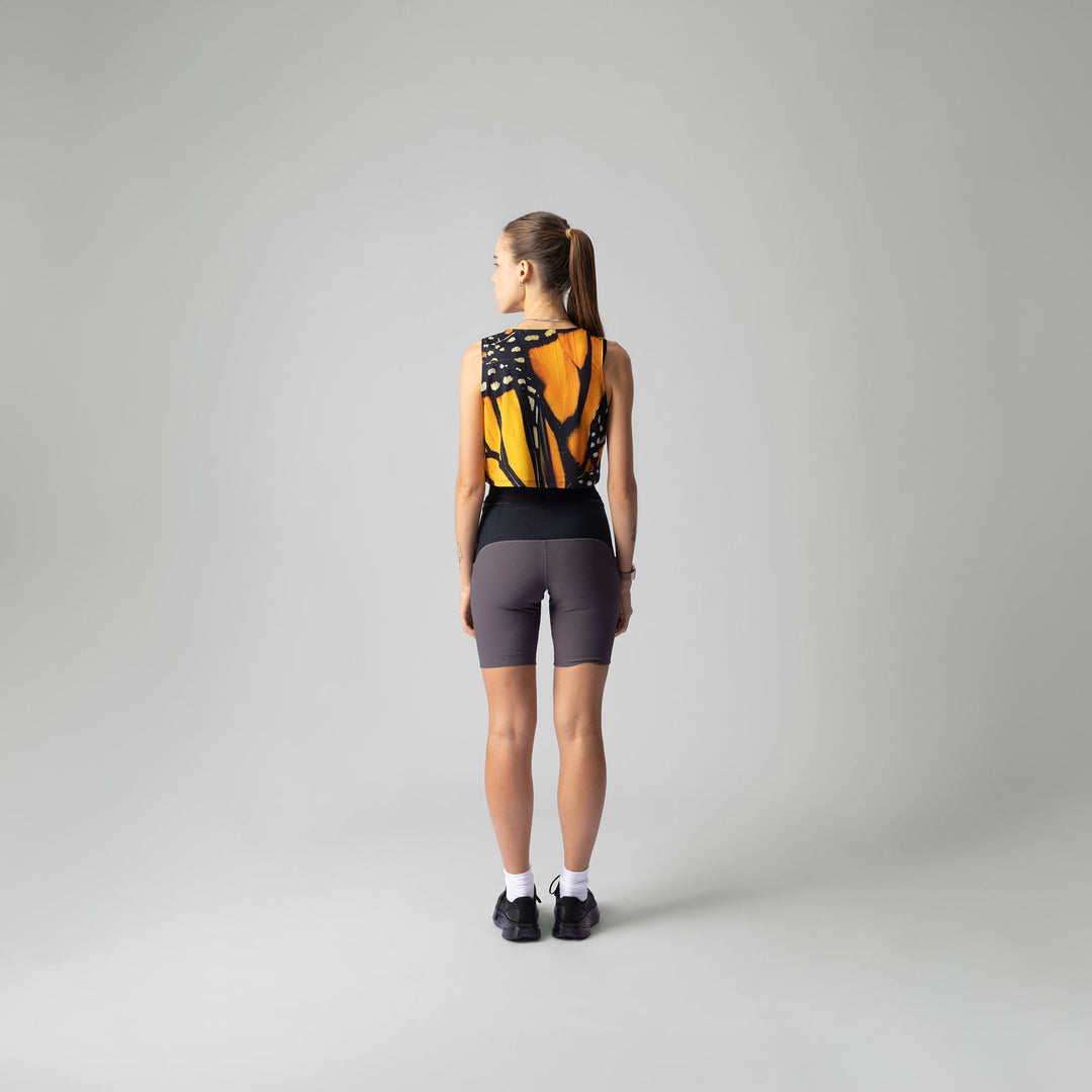 Front view of the Participation Monarch Crop Singlet showcasing its lightweight fabric and design.