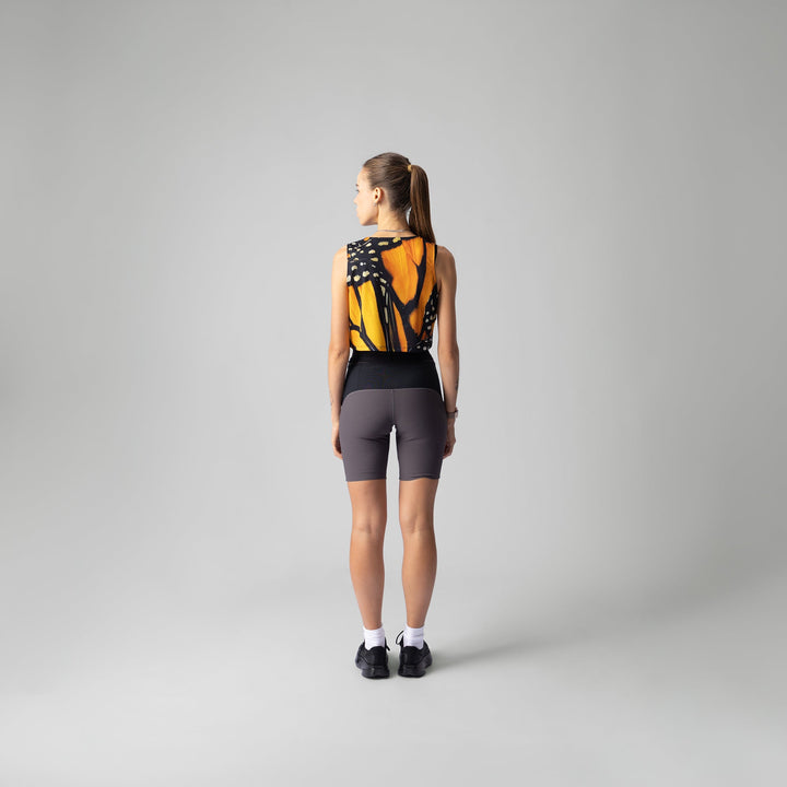Front view of the Participation Monarch Crop Singlet showcasing its lightweight fabric and design.