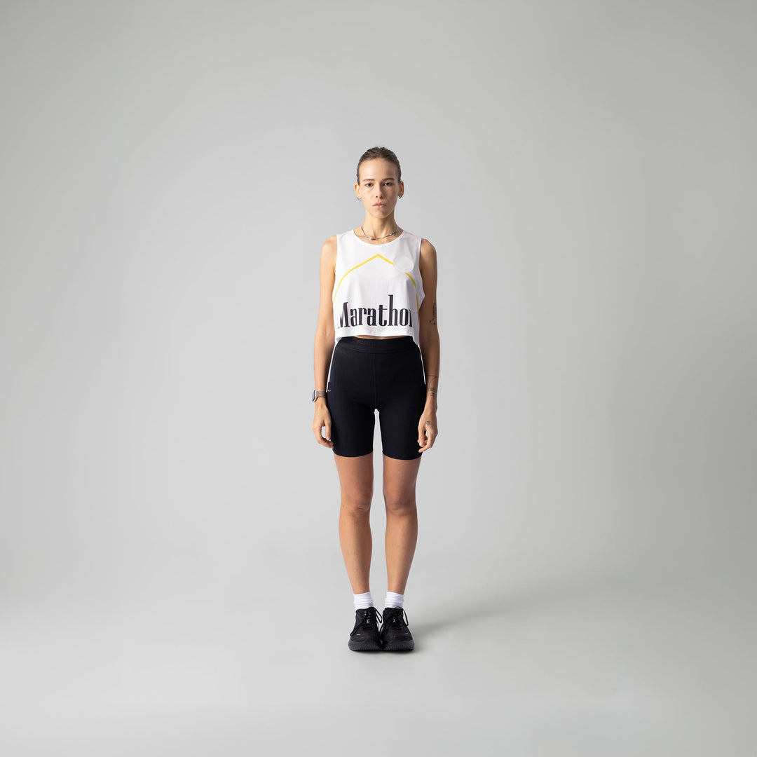 Front view of the Participation Marathon Light Crop Singlet showing its lightweight and breathable design in vibrant red color.