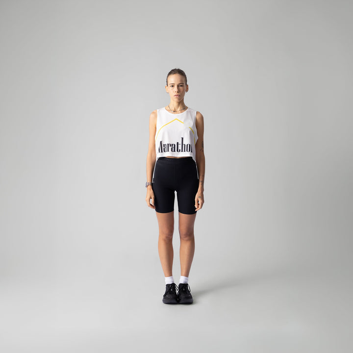 Front view of the Participation Marathon Light Crop Singlet showing its lightweight and breathable design in vibrant red color.