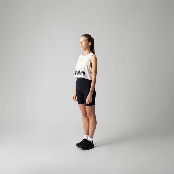 Front view of the Participation Marathon Light Crop Singlet showing its lightweight and breathable design in vibrant red color.