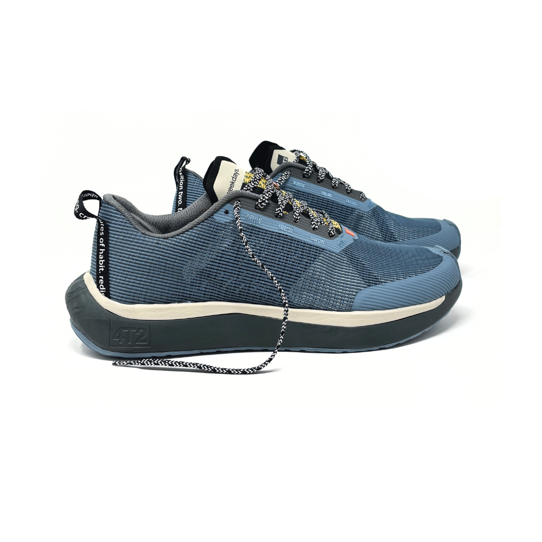 4T2 - weekdays, kind of blue running shoe, showcasing a modern design ideal for urban running.