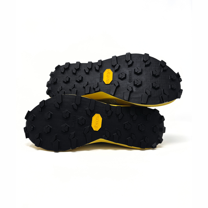 4T2 get lost footwear in beige and green, designed for trail running with a Vibram outsole.