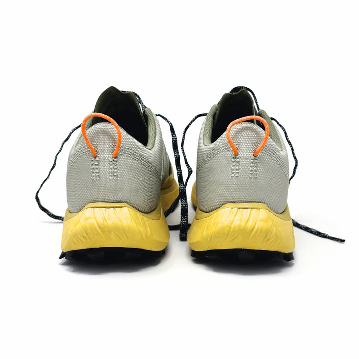4T2 get lost footwear in beige and green, designed for trail running with a Vibram outsole.