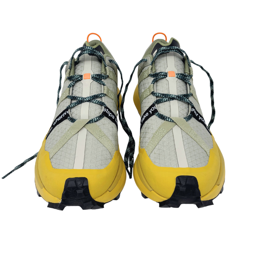 4T2 get lost footwear in beige and green, designed for trail running with a Vibram outsole.