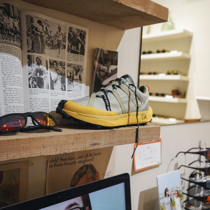 4T2 get lost footwear in beige and green, designed for trail running with a Vibram outsole.